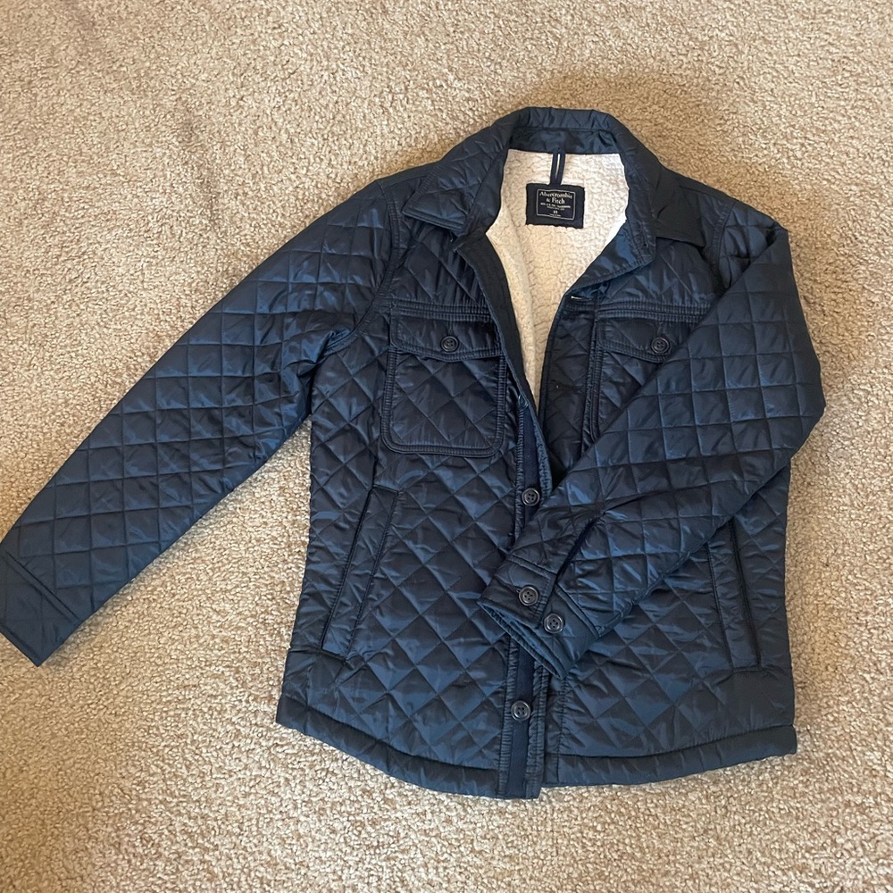 Men’s quilted blue Sherpa lined jacket